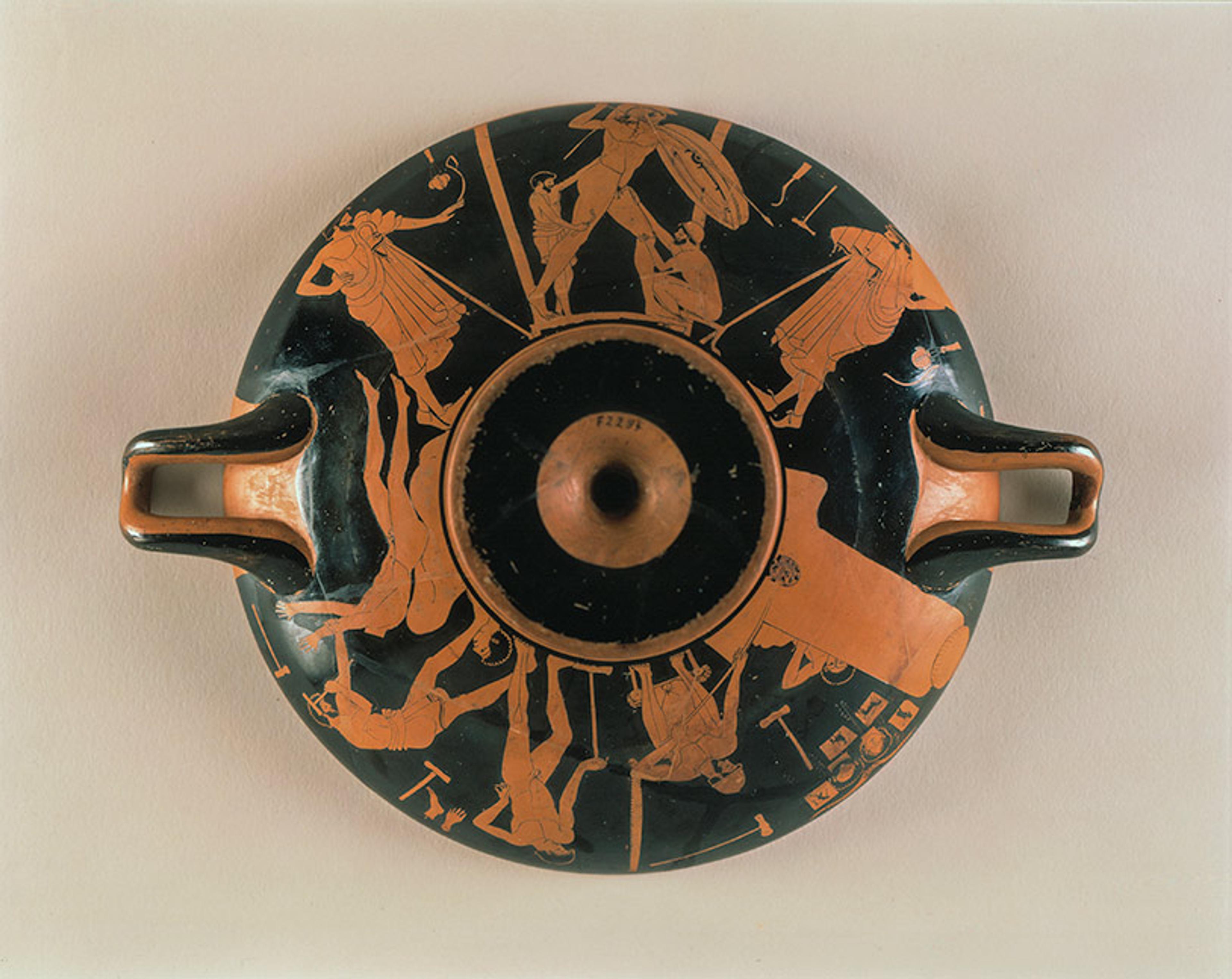 Ancient Greek red-figure kylix depicting various mythological scenes on the surface, viewed from above with two handles.